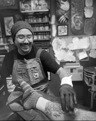 Geno Ray at work at Satori Tattoo