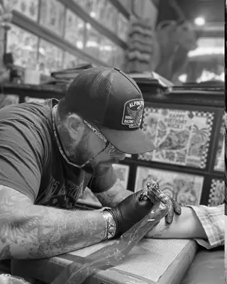 Nick Bryant at work at Satori Tattoo