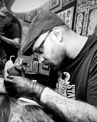 Oopa Phemister at work at Satori Tattoo