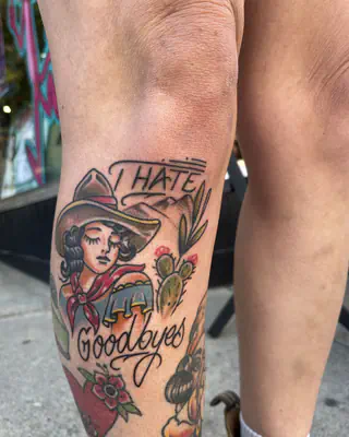 American traditional cowgirl with I Hate Goodbyes lettering and a cactus, below the knee